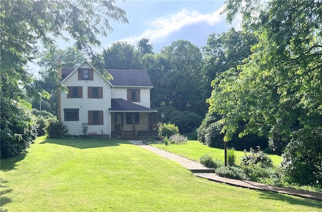 423 Bonniebrook Rd, Summit Twp, PA 16002 - view of front of property with a front lawn, covered porch, and a chimney