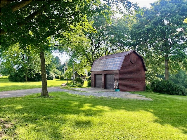 423 Bonniebrook Rd, Summit Twp, PA 16002 - view of green lawn featuring an outbuilding and a detached garage