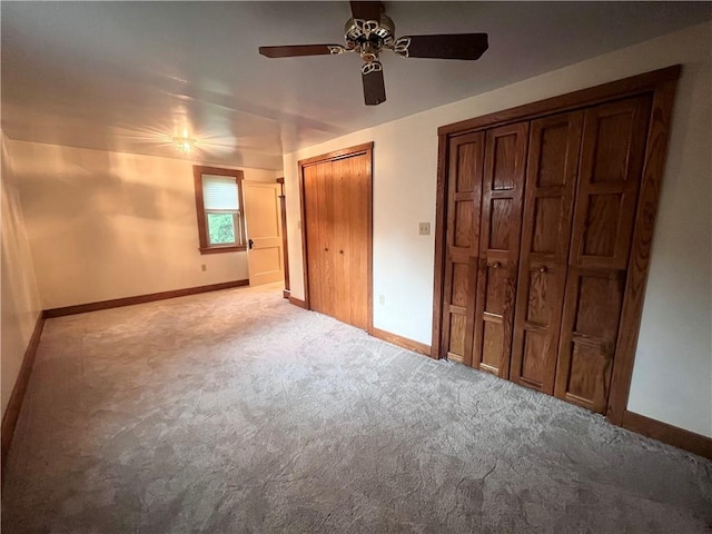 423 Bonniebrook Rd, Summit Twp, PA 16002 - unfurnished bedroom with light colored carpet and a ceiling fan