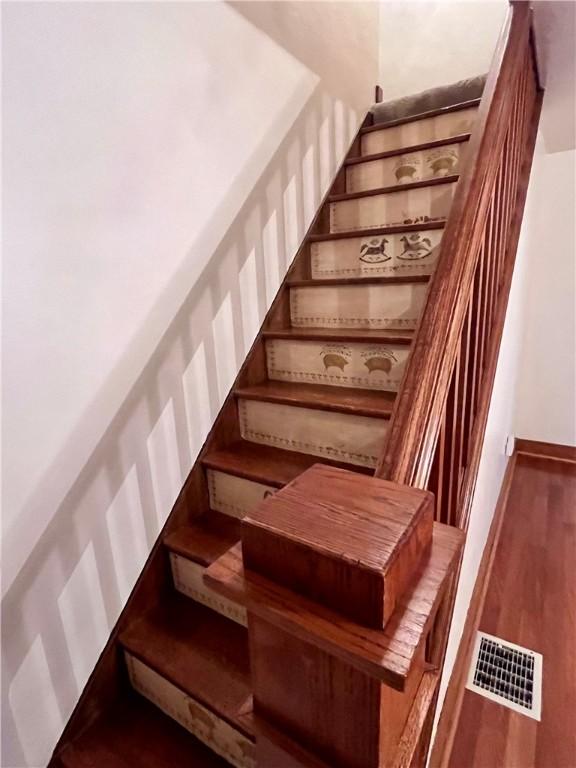 423 Bonniebrook Rd, Summit Twp, PA 16002 - stairway with wood finished floors