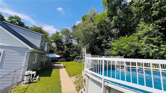 324 Paul Dr, Lower Burrell, PA 15068 - view of yard with an outdoor pool