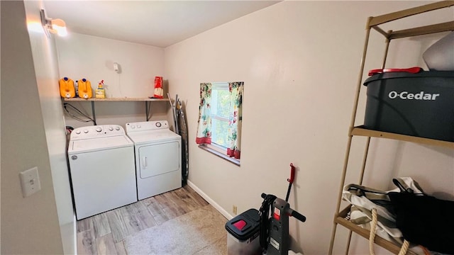324 Paul Dr, Lower Burrell, PA 15068 - laundry area with washing machine and dryer and light wood-style floors