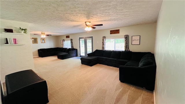 324 Paul Dr, Lower Burrell, PA 15068 - living area featuring a ceiling fan, carpet flooring, and a textured ceiling