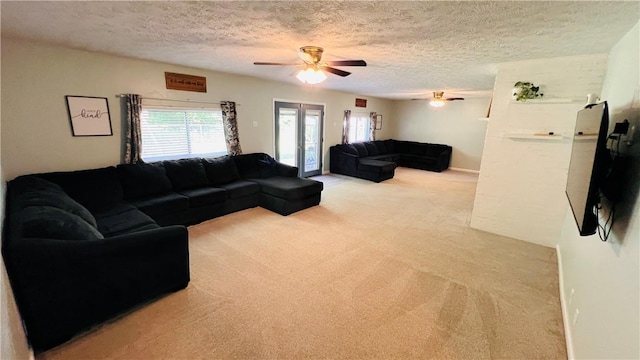 324 Paul Dr, Lower Burrell, PA 15068 - living room featuring a textured ceiling, light colored carpet, a ceiling fan, and french doors