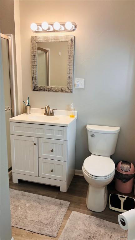 324 Paul Dr, Lower Burrell, PA 15068 - bathroom with vanity and wood finished floors