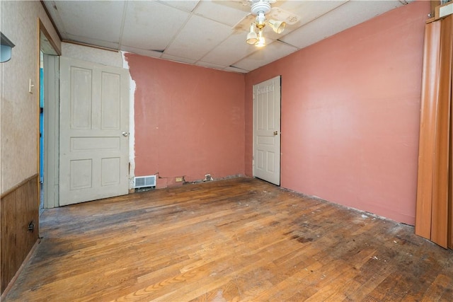 1115 Fairdale St, Sheraden, PA 15204 - empty room featuring wood-type flooring, a ceiling fan, and a paneled ceiling