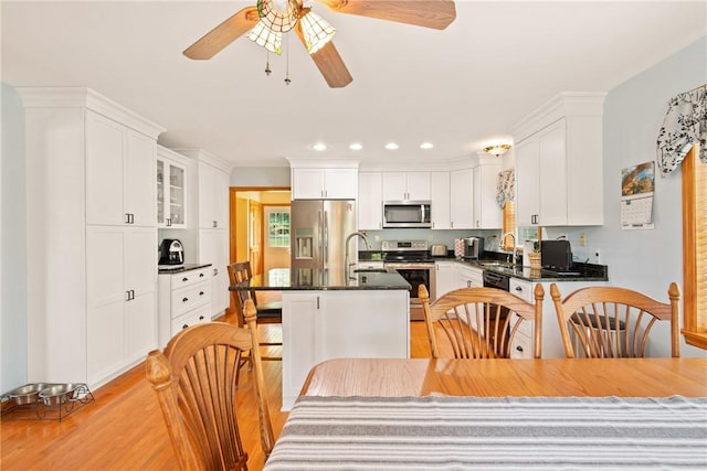 604 Lake Shore Rd, Lake Stonycreek, PA 15541 - dining area featuring light wood-style flooring, ceiling fan, and recessed lighting