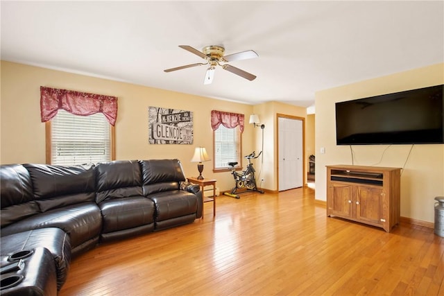 604 Lake Shore Rd, Lake Stonycreek, PA 15541 - living area with ceiling fan, light wood-style flooring, and baseboard heating