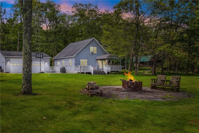 604 Lake Shore Rd, Lake Stonycreek, PA 15541 - rear view of property featuring an outdoor fire pit, a gazebo, a deck, an outdoor structure, and a yard