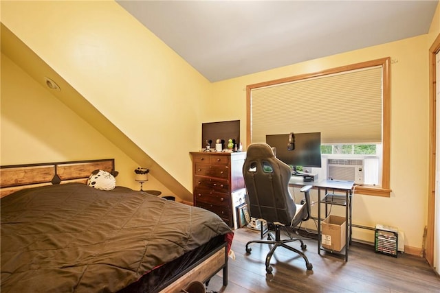 604 Lake Shore Rd, Lake Stonycreek, PA 15541 - bedroom with wood finished floors, cooling unit, and lofted ceiling