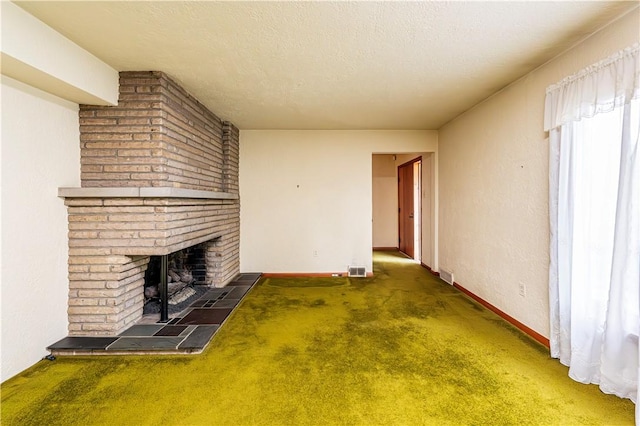 127 Mount Odin Dr, Hempfield Twp, PA 15601 - unfurnished living room featuring a fireplace and carpet floors
