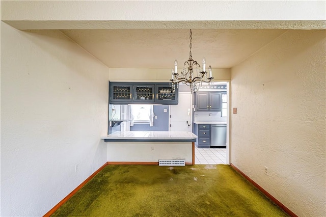 127 Mount Odin Dr, Hempfield Twp, PA 15601 - kitchen featuring dishwasher, a chandelier, carpet, light countertops, and a peninsula