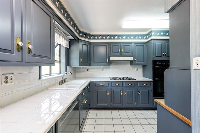 127 Mount Odin Dr, Hempfield Twp, PA 15601 - kitchen featuring tile countertops, dishwasher, oven, light tile patterned floors, and decorative backsplash