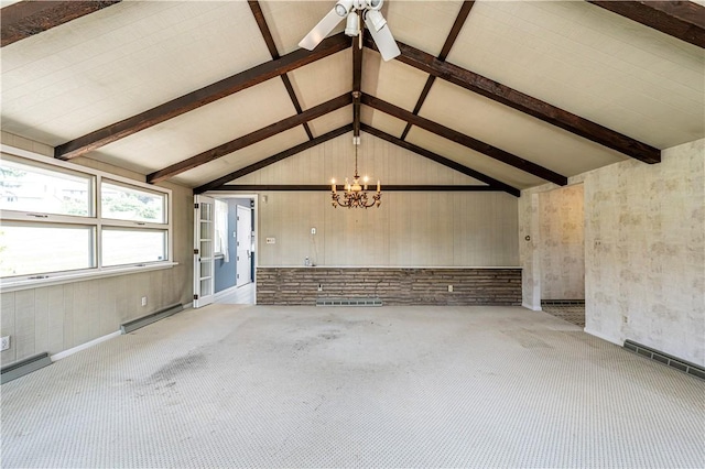 127 Mount Odin Dr, Hempfield Twp, PA 15601 - unfurnished living room featuring baseboard heating, light colored carpet, and a chandelier