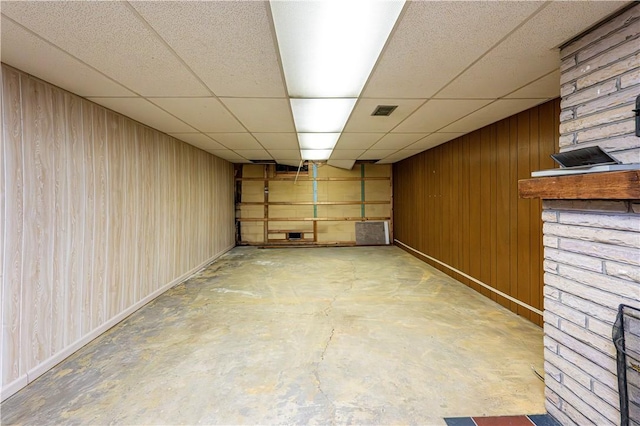 127 Mount Odin Dr, Hempfield Twp, PA 15601 - finished basement with wooden walls and a paneled ceiling