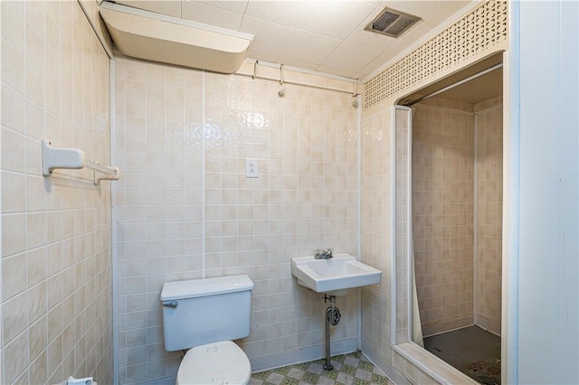 127 Mount Odin Dr, Hempfield Twp, PA 15601 - bathroom with tile walls and a stall shower