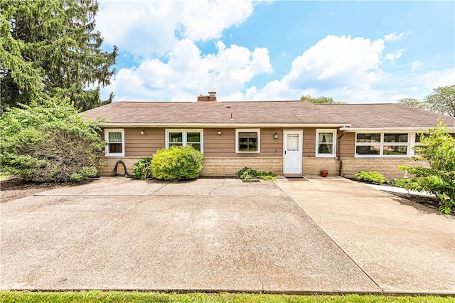 127 Mount Odin Dr, Hempfield Twp, PA 15601 - single story home with brick siding and a chimney