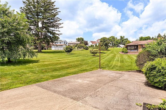 127 Mount Odin Dr, Hempfield Twp, PA 15601 - view of grassy yard featuring a residential view and a patio area