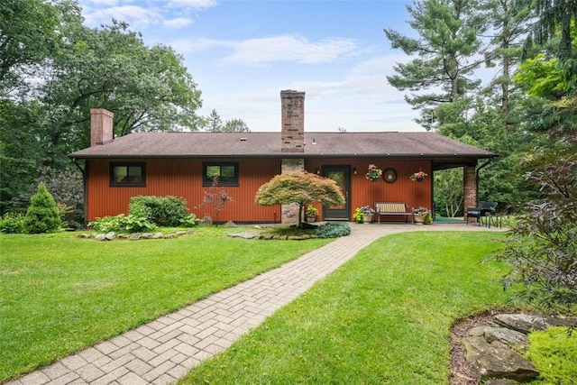 71 Mcclure Rd, West Deer, PA 15024 - rear view of property with a chimney and a yard