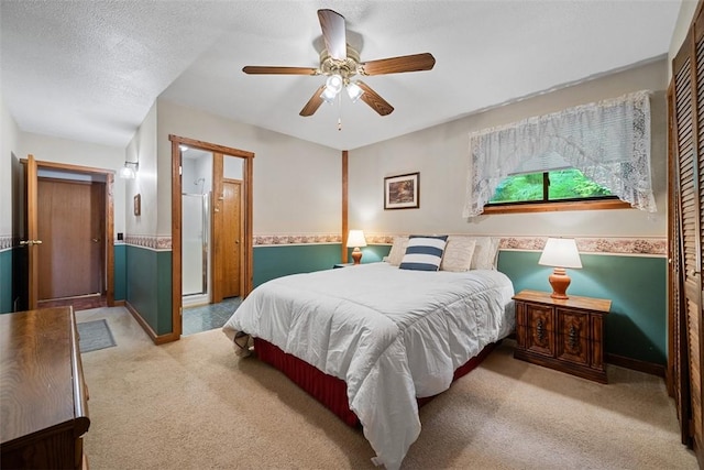 71 Mcclure Rd, West Deer, PA 15024 - bedroom with carpet, wainscoting, ceiling fan, and a textured ceiling