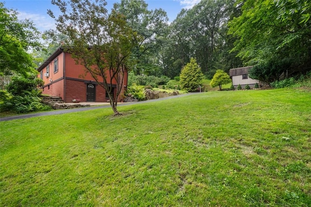 71 Mcclure Rd, West Deer, PA 15024 - view of grassy yard with a storage shed