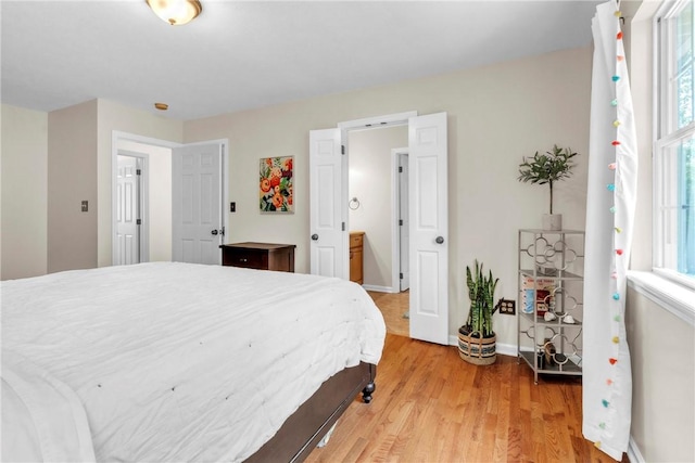 114 Franklin Oaks Dr, Franklin Twp, PA 16001 - bedroom featuring light wood finished floors and multiple windows