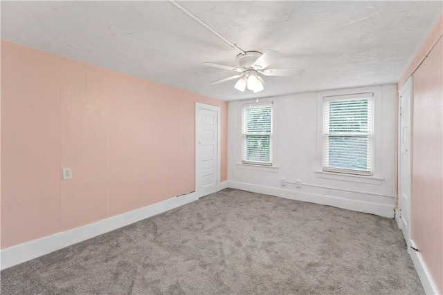 90 S Thompson Ln, North Huntingdon, PA 15642 - carpeted spare room with a ceiling fan and baseboards