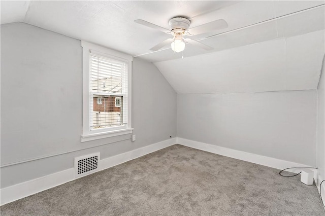 90 S Thompson Ln, North Huntingdon, PA 15642 - additional living space with lofted ceiling, carpet floors, and ceiling fan