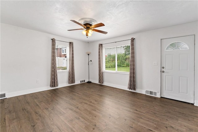 90 S Thompson Ln, North Huntingdon, PA 15642 - entryway featuring healthy amount of natural light, a ceiling fan, and wood finished floors