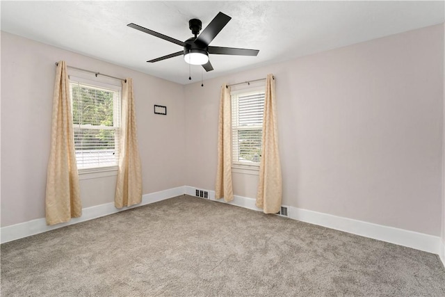 90 S Thompson Ln, North Huntingdon, PA 15642 - empty room with carpet flooring and a ceiling fan