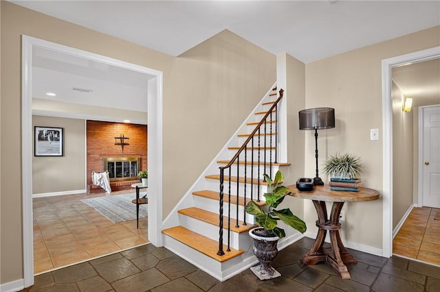 2671 Thorntree Dr, Saint Clair, PA 15241 - stairway featuring recessed lighting and a brick fireplace