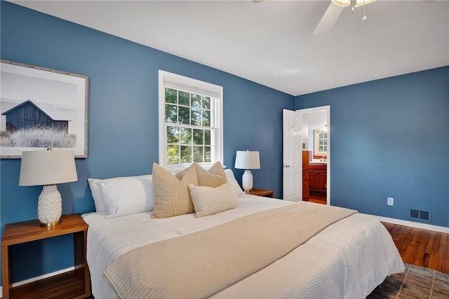 2671 Thorntree Dr, Saint Clair, PA 15241 - bedroom with wood finished floors, ensuite bath, and a ceiling fan