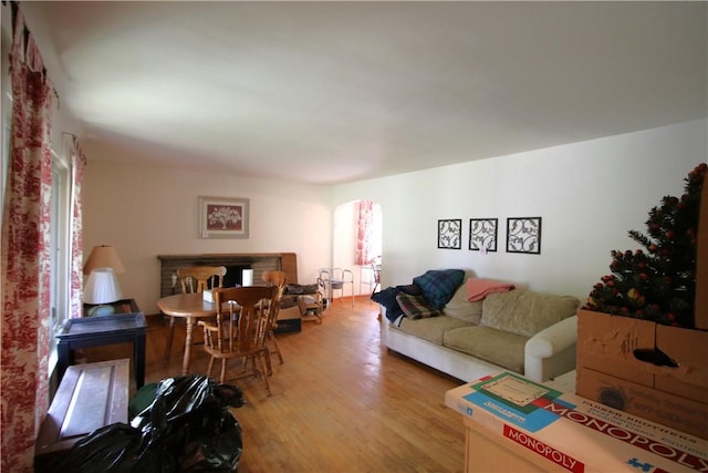 138 Demmel Dr, Peters Twp, PA 15317 - living area with plenty of natural light, light wood finished floors, and arched walkways