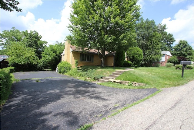 138 Demmel Dr, Peters Twp, PA 15317 - view of property hidden behind natural elements with a front yard