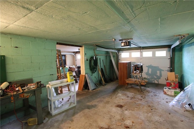 138 Demmel Dr, Peters Twp, PA 15317 - garage with a garage door opener and concrete block wall