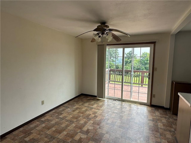 201 N 10th St, Connellsville, PA 15425 - spare room with ceiling fan and brick patterned floors