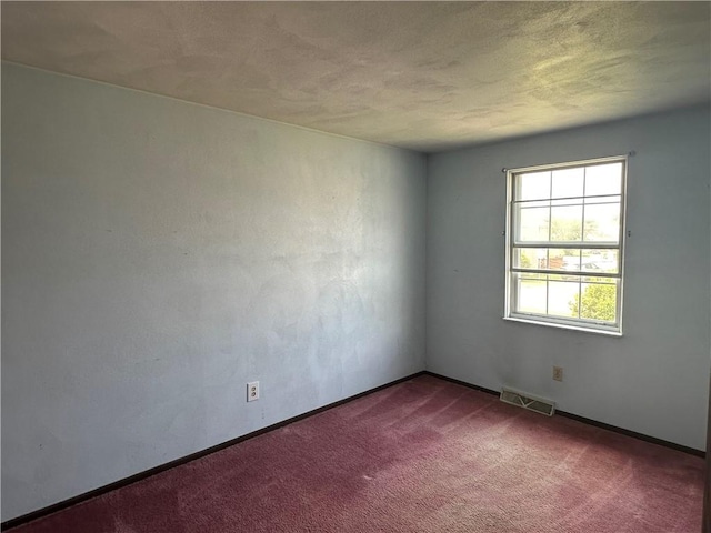 201 N 10th St, Connellsville, PA 15425 - carpeted empty room with baseboards