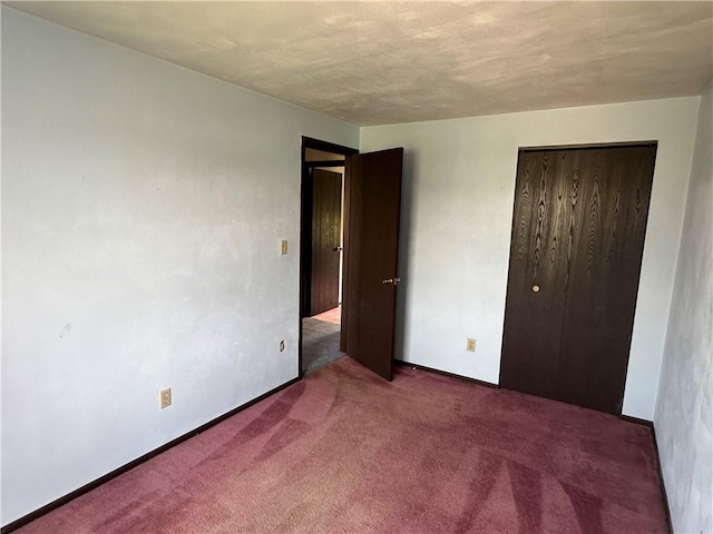 201 N 10th St, Connellsville, PA 15425 - unfurnished bedroom featuring carpet flooring and a closet