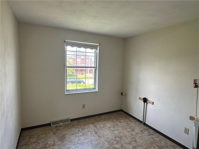 201 N 10th St, Connellsville, PA 15425 - empty room with baseboards
