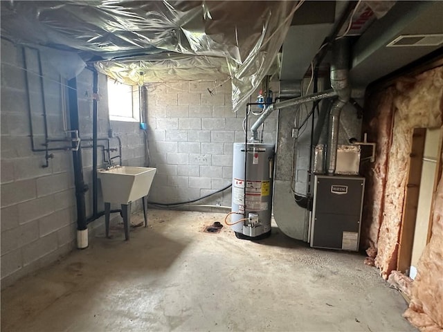 201 N 10th St, Connellsville, PA 15425 - below grade area with water heater and heating unit