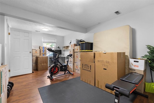 3269 Dawson St, Oakland, PA 15213 - workout area with wood finished floors and a textured ceiling
