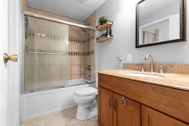 3269 Dawson St, Oakland, PA 15213 - full bath with vanity, shower / bath combination with glass door, tile patterned floors, and a textured ceiling