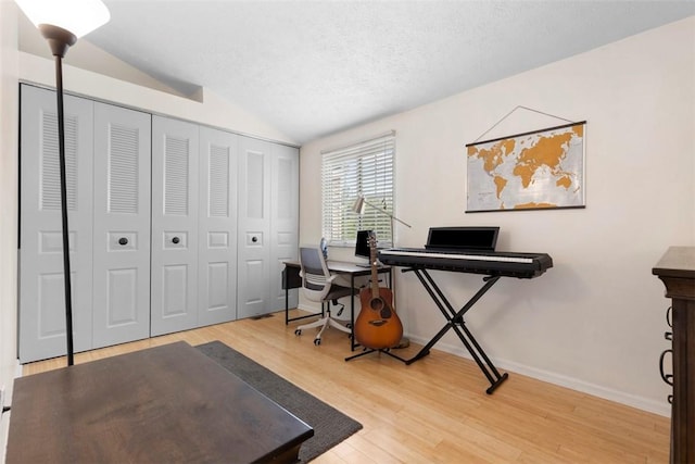 3269 Dawson St, Oakland, PA 15213 - office space featuring lofted ceiling, wood finished floors, and a textured ceiling