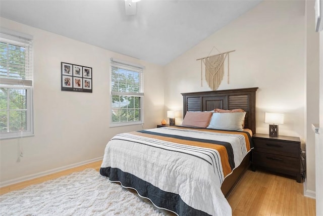 3269 Dawson St, Oakland, PA 15213 - bedroom with light wood-style flooring, vaulted ceiling, and a ceiling fan