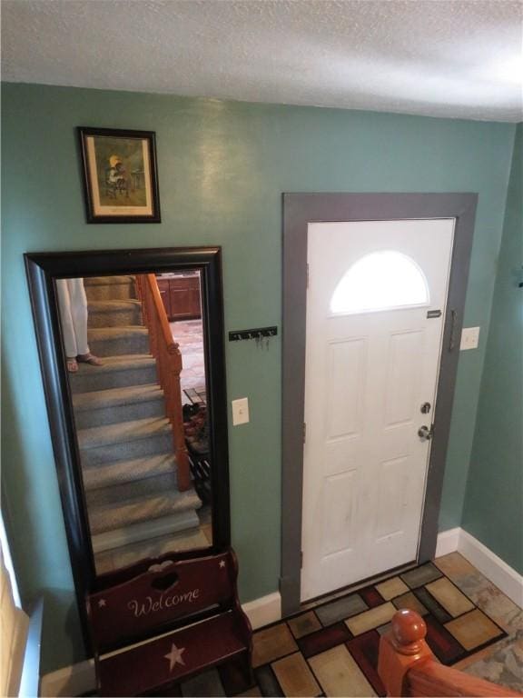 103 Cedar St, Masontown, PA 15461 - entrance foyer featuring a textured ceiling and baseboards
