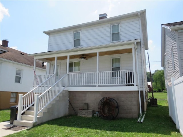 103 Cedar St, Masontown, PA 15461 - view of front of house with a porch, a front lawn, a ceiling fan, and stairs