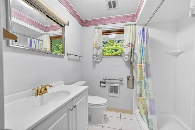 215 Diane Dr, Carroll Twp, PA 15063 - bathroom with vanity, heating unit, and tile patterned flooring