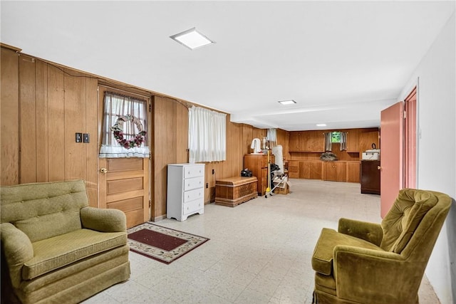 215 Diane Dr, Carroll Twp, PA 15063 - living area featuring wooden walls and light flooring