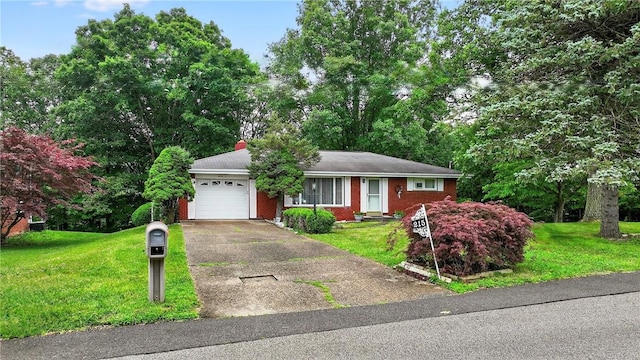 215 Diane Dr, Carroll Twp, PA 15063 - ranch-style home featuring a garage, asphalt driveway, a front lawn, and brick siding