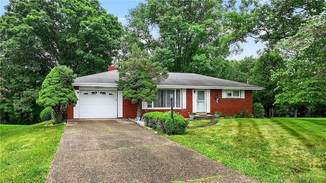 215 Diane Dr, Carroll Twp, PA 15063 - ranch-style house with driveway, an attached garage, and a front yard